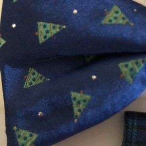 Blue bow tie with green trees with silver sparkles